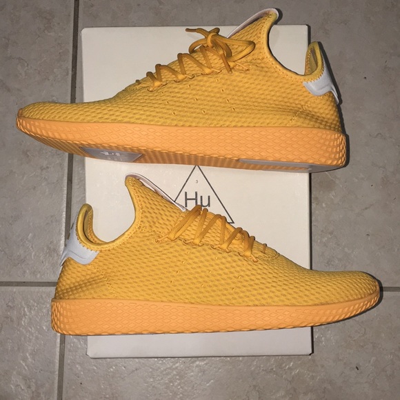 pharrell williams gold shoes